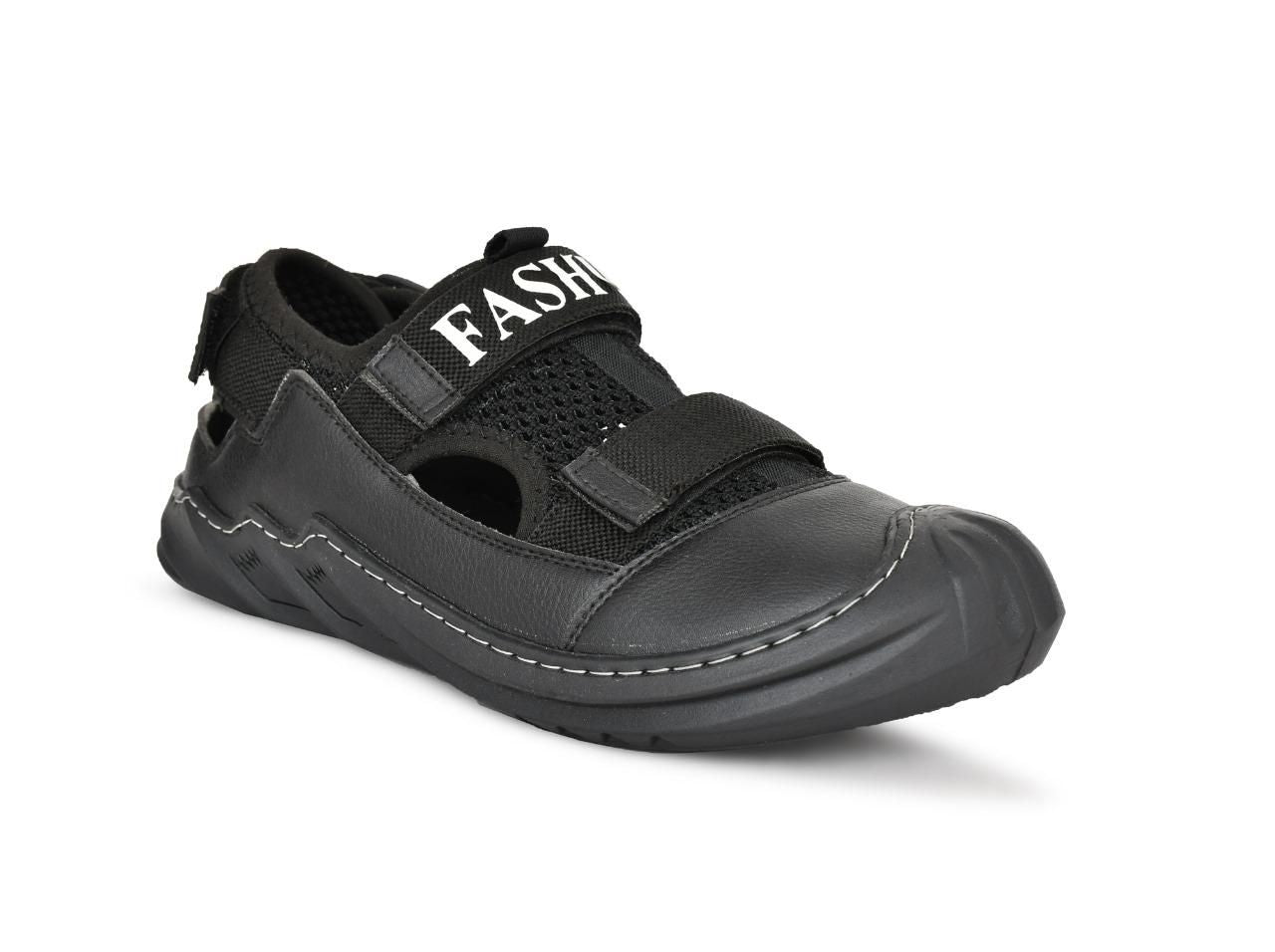 Black sandal with 'FASHION' strap on a white background